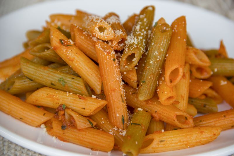 Penne Arrabbiata with spicy tomato sauce and fresh basil