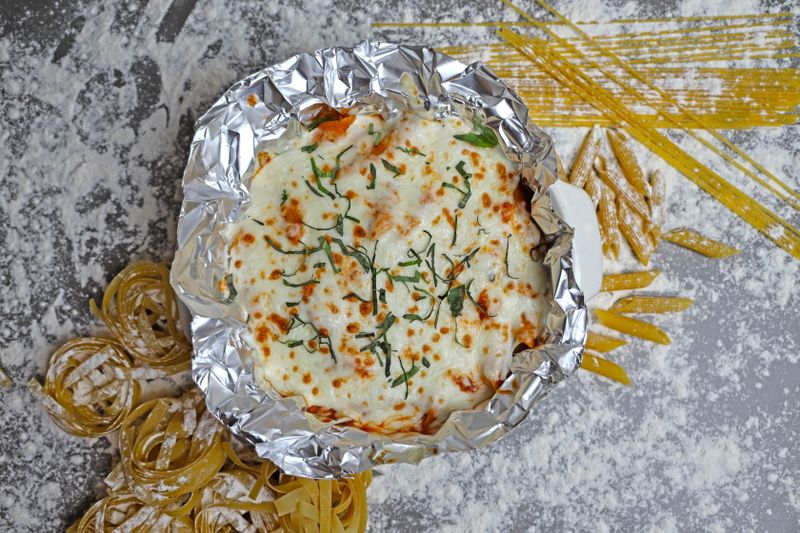 Baked Ziti pasta with ricotta, mozzarella and marinara sauce